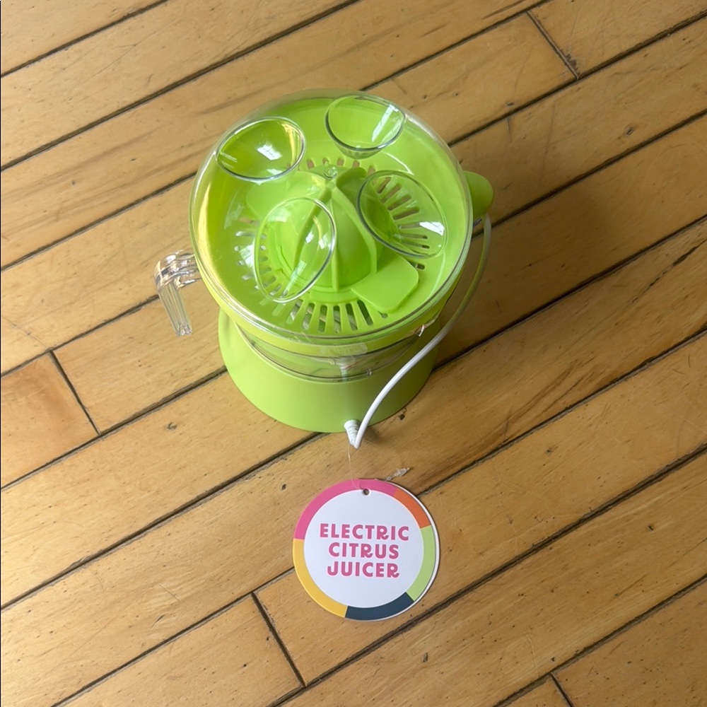 Vibrant Green Citrus Juicer for Party Drinks